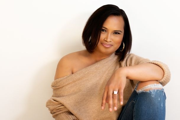 Gaysha Starr seated in a neutral sweater and jeans